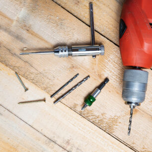 a-top-view-of-an-electric-drill-nails-and-other-r-2026-03-26-10-23-21-utc