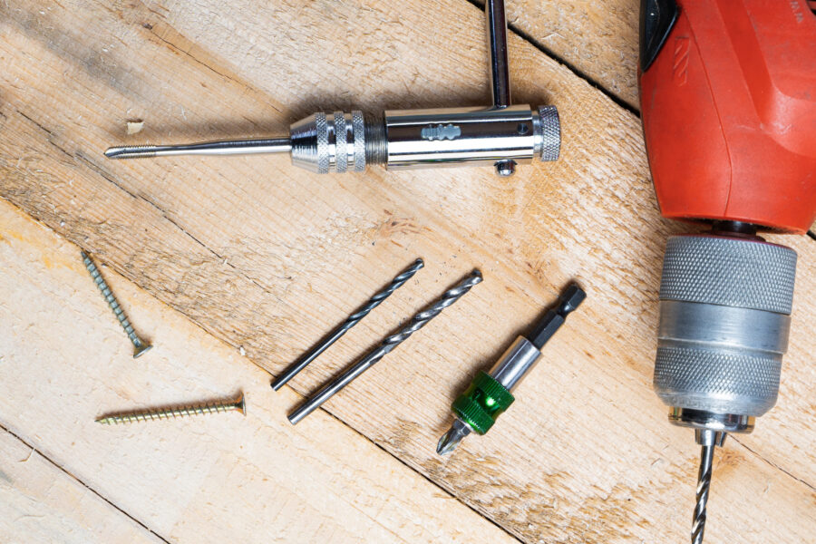 a-top-view-of-an-electric-drill-nails-and-other-r-2026-03-26-10-23-21-utc